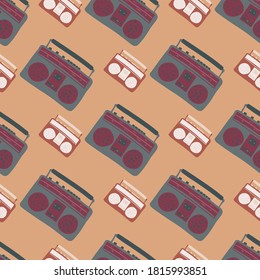 Seamless stylized music pattern with tape recorders. Grey 80s ornament on orange pale background. Perfect for wallpaper, textile, wrapping paper, fabric print. Vector illustration.