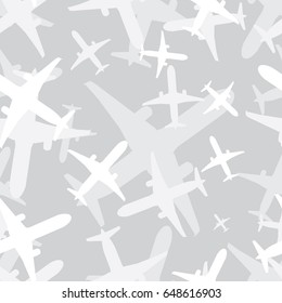 Seamless subtle gray airplane bottom view multiple silhouettes traveling pattern vector
