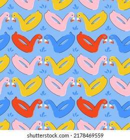Seamless summer pattern with colorful flamingo with splashes in bright blue, pink, yellow colors in flat style. For print, package, wrapper, background.