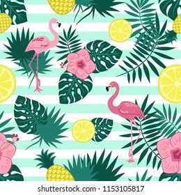 Seamless summer pattern with flamingos, lemons, pineapple, tropical leaves and flowers on a striped background.