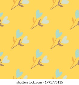 Seamless summer pattern with floristic heart twigs shapes. Yellow bright background. Naive stylized design. Perfect for wallpaper, wrapping paper, textile print, fabric. Vector illustration.