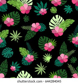 Seamless summer pattern with tropical leaves and flowers on a black background