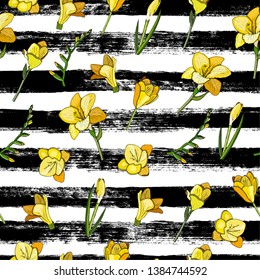Seamless summer pattern. Vector background with hand drawn ink stripes, freesia flowers for your design. Eps10
