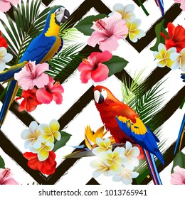Seamless summer tropical background with tropical flowers and colorful parrots. Vector illustration.