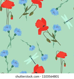 Seamless summer vector illustration with meadow cornflowers, poppies and dragonflies on a green background. For decorating textiles, packaging and web design