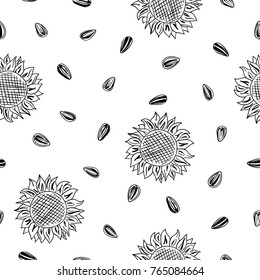 Seamless sunflower pattern with heads and seeds. Vector balck and white illustration.