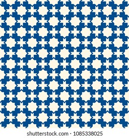Seamless surface design with arabic ornament. Moroccan stars and crosses motif. Oriental traditional pattern with repeated mosaic tile. Tracery window wallpaper. Arabesque digital paper, textile print