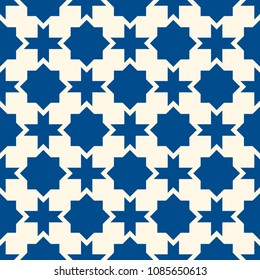 Seamless surface design with arabic ornament. Moroccan stars and crosses motif. Oriental traditional pattern with repeated mosaic tile. Tracery window wallpaper. Arabesque digital paper, textile print