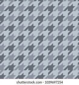 Seamless surface pattern design with houndstooth ornament. Classic fashion fabric print. Mosaic motif. Checkered geometric abstract background. Digital paper, textile print, page fill. Vector art.