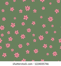 Seamless surface pattern with pink cherry blossoms on vintage green colored background. Vector illustration with cherry blossoms.