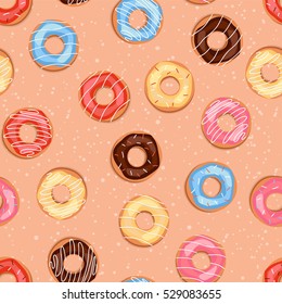 Seamless sweet donuts into the glaze. Pattern.