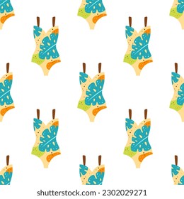seamless swimsuit pattern in cartoon style, colorful bathing suits with tropical print isolated on white background, beachwear for girls or women