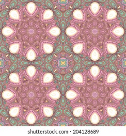 Seamless symmetrical pattern in pink, green, blue and white colors. Mandala. Kaleidoscopic design.