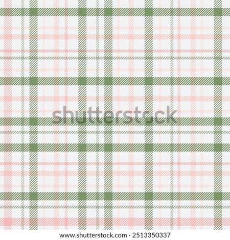Seamless tartan plaid pattern. Herringbone checked plaid in pink and green winter coat, scarf, poncho, blanket, or other fashion textile design.