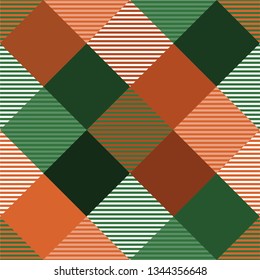 Seamless tartan plaid pattern in orange and green tone.