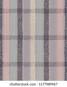 Seamless tartan style vector pattern with stripes composed with irregular dots. Distressed relaxed plaid. Boho style. Hand drawn art. Ethnic tie dye fabric.