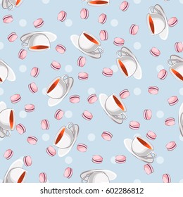 Seamless teacups and macarons pattern on the blue background