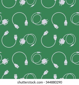 Seamless technology vector pattern, chaotic background with icons of usb cables and batteries, over grey backdrop
