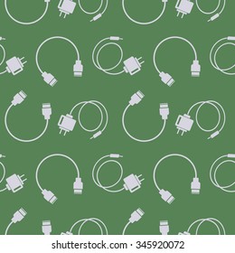 Seamless technology vector pattern, chaotic background with icons of usb cables and batteries, over green backdrop