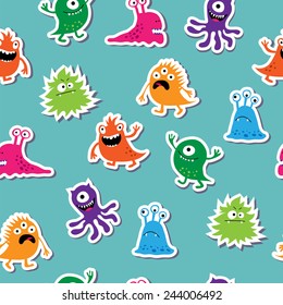 Seamless template with cute colorful monsters