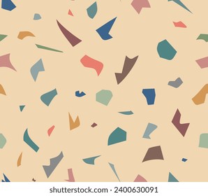 Seamless terrazzo pattern of colorful specks on warm beige backdrop. Abstract geometric hipster background.