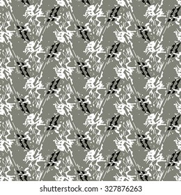 Seamless textile pattern with white and black elements on beige background