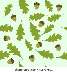 Seamless texture. Acorns and oak leaves on a blue background