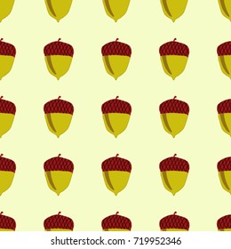Seamless texture. Acorns on a yellow background