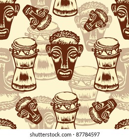 Seamless texture with African masks.