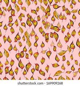 seamless texture of autumn leaves on a pink background