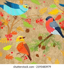 seamless texture with birds on branches of autumn trees against grange background. bullfinch perching on pine with cones. blue feathered creature holding berry in beak sitting on limb of rowan