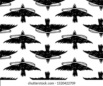 Seamless texture with black birds flying through the ring. Black crow or raven. 