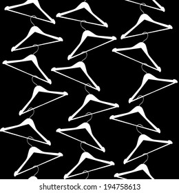 Seamless texture in black and white with hangers