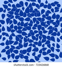 Seamless texture. Blue petals on a blue background