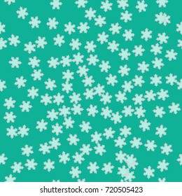 Seamless texture. Blue snowflakes on a turquoise background