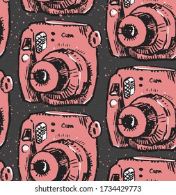 Seamless texture with Camera. Repeating background with photo camera. A great background for your design