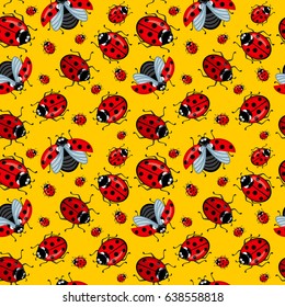 Seamless texture. Cartoon ladybugs red on a yellow background. Can be used for a background, wallpaper, textile design