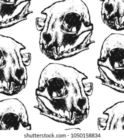Seamless texture with cat skull. Repeating background. Tile pattern. Can be used as wallpaper, desktop, wrapping, fabric or background for your blog, covers, cards. Black and white.
