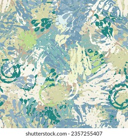 Seamless texture. Chaotic camouflage consisting of drops and blots. Gray-blue-brown-green not bright shades of color.