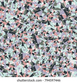Seamless texture. Chaotically arranged colored sharp triangles. Six-color pattern. Similarity of the pattern of a chipboard.