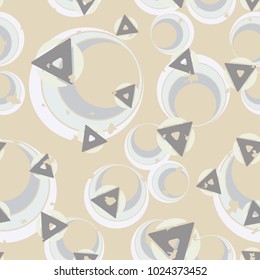 Seamless texture. Chaotically arranged triangles and circles. A cheerful pattern for children and women.