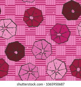 Seamless texture. Checkered striped background. Abstract seven-petalled flowers. Multicolored pattern.