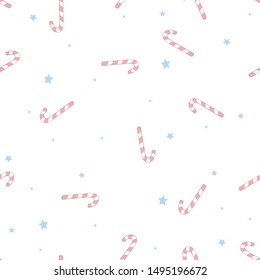 Seamless texture with Christmas candy cane decorated and holly. Striped candy canes on a white background. Christmas background and pattern.