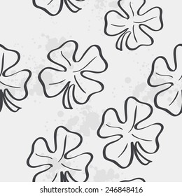 Seamless texture with clover leaf for St. Patrick's Day. black contour