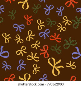 Seamless texture. Colored bows on a brown background
