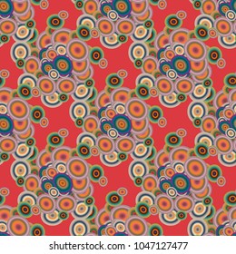 Seamless texture with colored circle pattern for background.