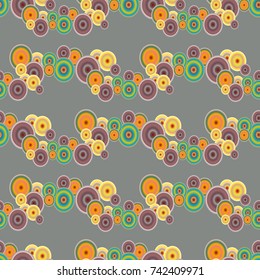 Seamless texture with colored circle pattern for background.