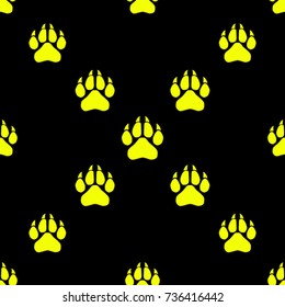 Seamless texture. Colored traces of paws on a black background