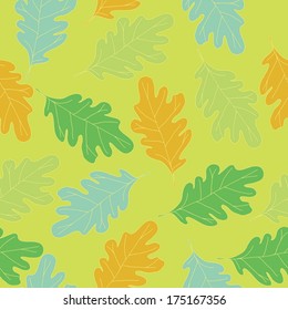Seamless texture with colorful oak leaves. Floral background. Vector art