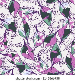 A seamless texture consisting of chaotically arranged multi-colored leaves.
The leaves are on the background of splashes and smears.